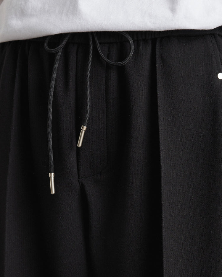 Soft straight-leg pants with waistband and drawstring