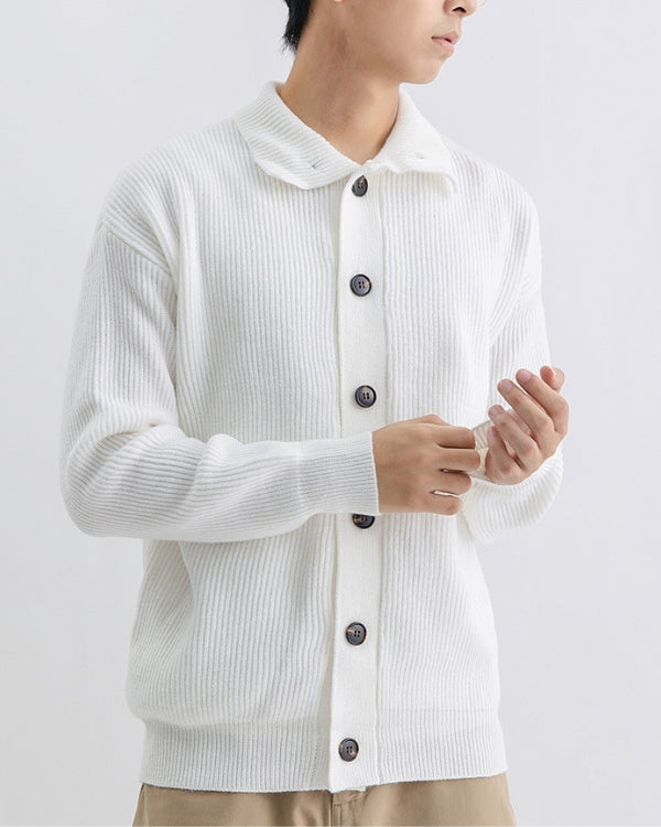 Stretchy knit sweater with high neck and buttons