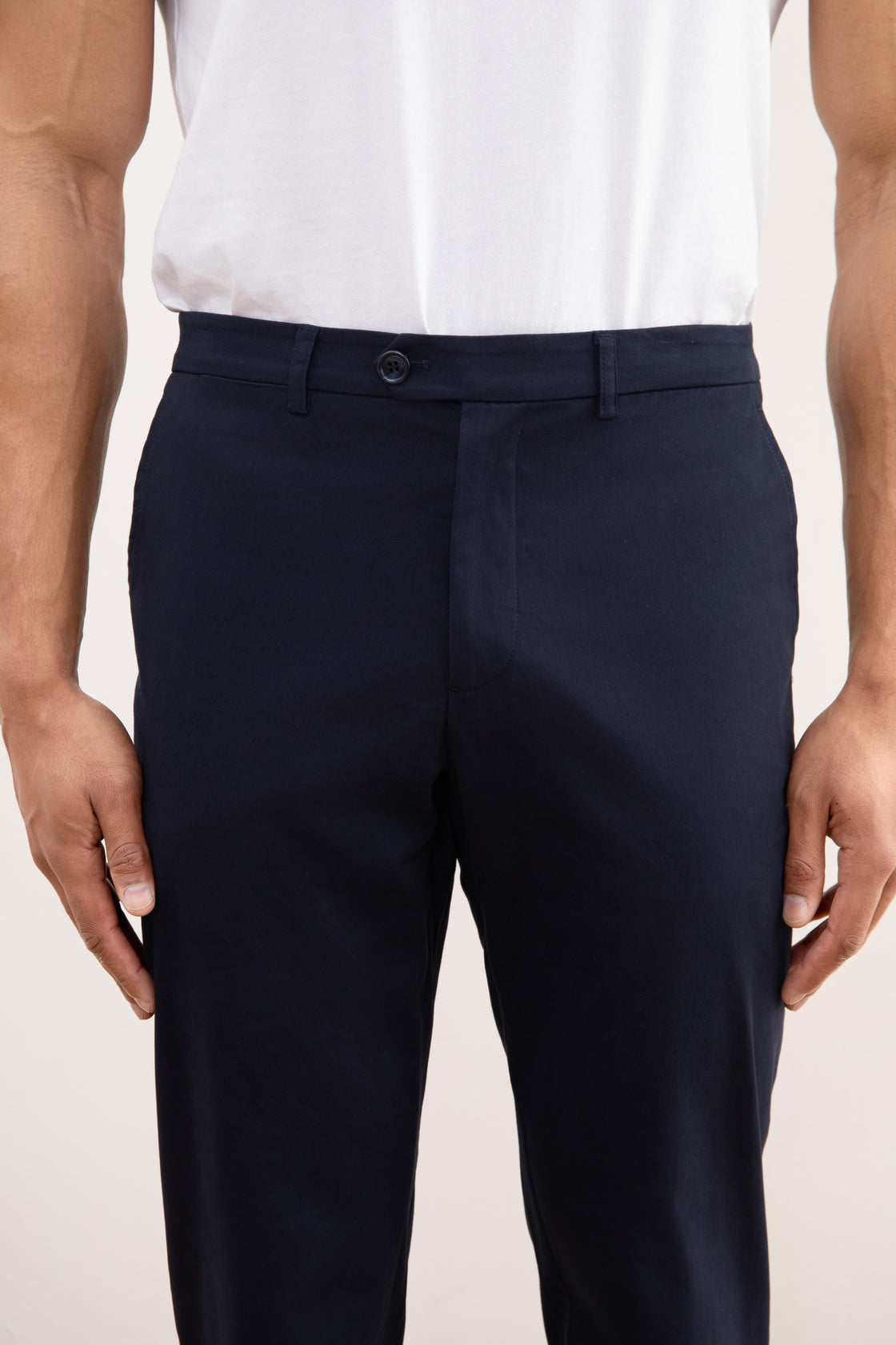 Dark blue chinos with a straight cut