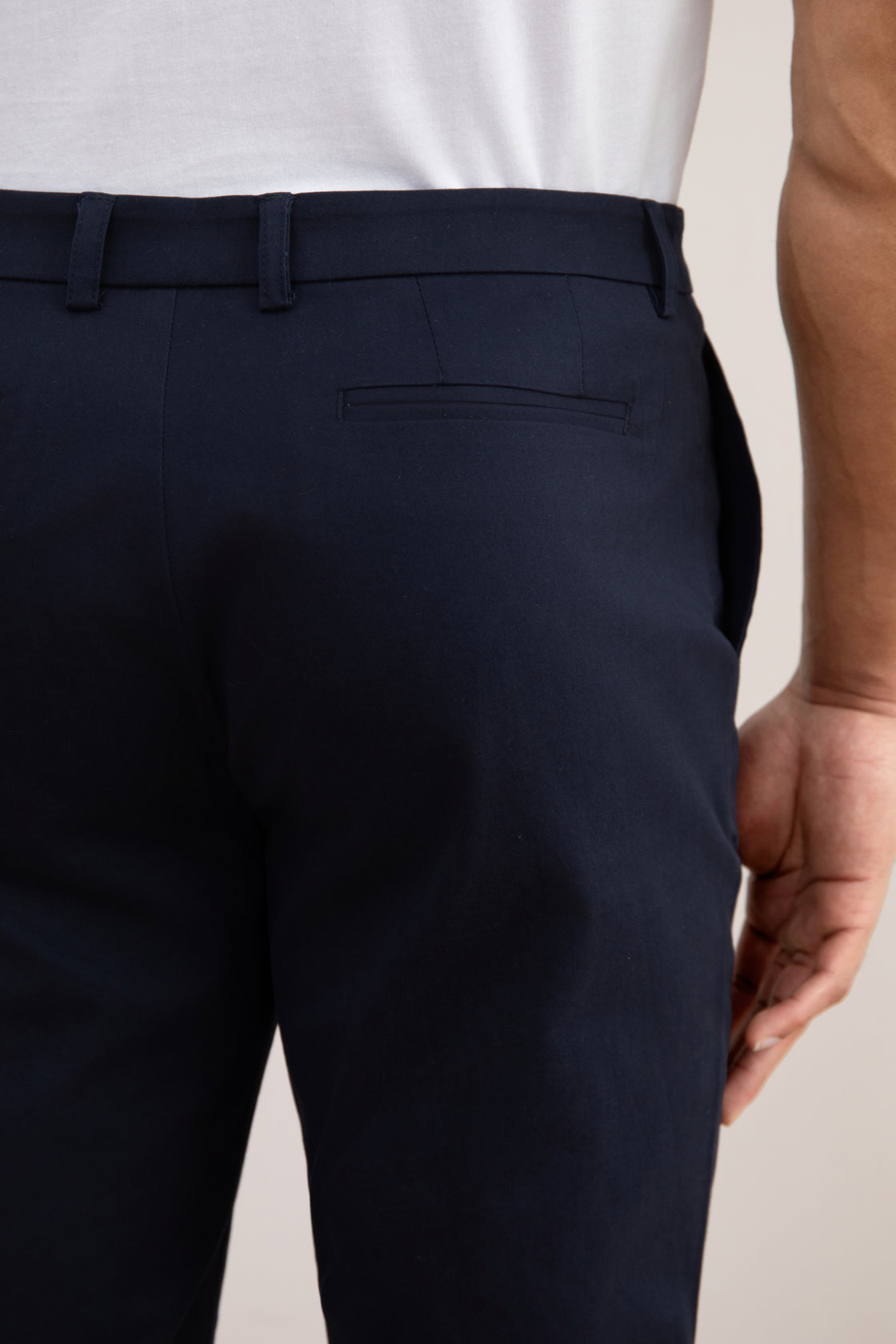 Dark blue chinos with a straight cut