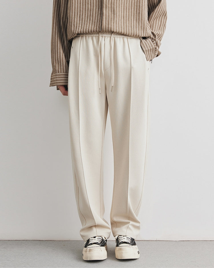 Soft straight-leg pants with waistband and drawstring