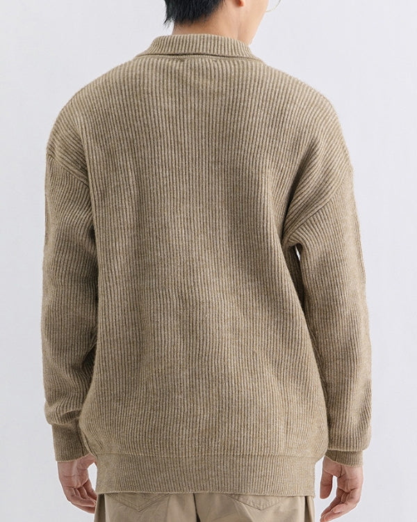 Stretchy knit sweater with high neck and buttons