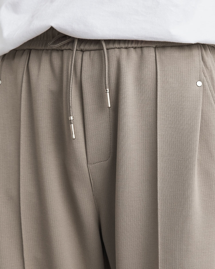 Soft straight-leg pants with waistband and drawstring
